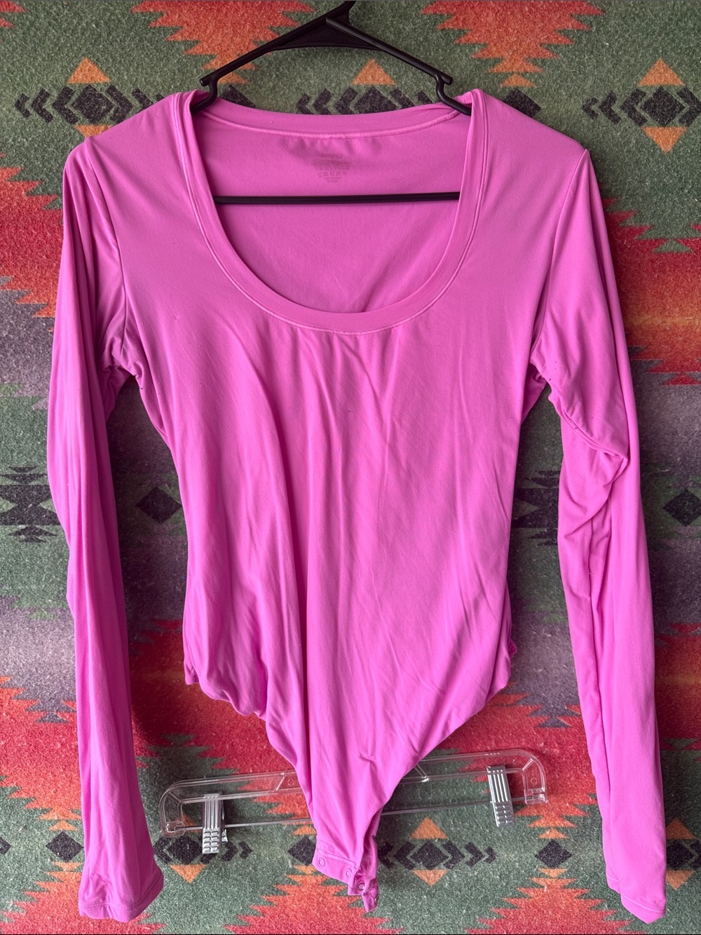 SKIMS Long Sleeve Scoop Neck Bodysuit in Bright Pink